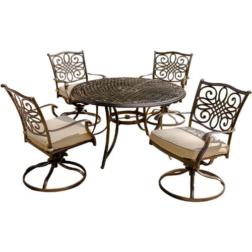 Hanover 5-Piece Four Traditions Swivel Rocker Chairs with Tan Cushions and 48" Round Cast Table, Patio Dining Set for 4, Premium Weather Resistant Outdoor Furniture